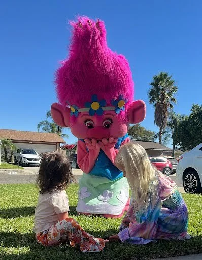 Pink Troll party character in San Diego